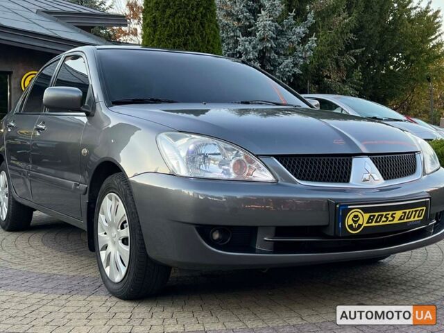 Сірий Міцубісі Lancer, об'ємом двигуна 1.6 л та пробігом 166 тис. км за 5400 $, фото 1 на Automoto.ua