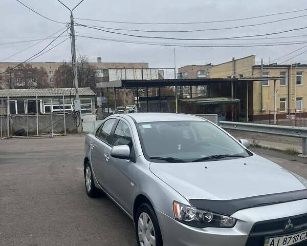 Серый Мицубиси Лансер, объемом двигателя 1.5 л и пробегом 190 тыс. км за 5800 $, фото 1 на Automoto.ua