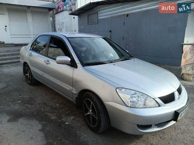 Сірий Міцубісі Lancer, об'ємом двигуна 1.6 л та пробігом 60 тис. км за 7000 $, фото 1 на Automoto.ua