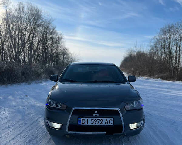 Сірий Міцубісі Lancer, об'ємом двигуна 1.5 л та пробігом 215 тис. км за 5600 $, фото 1 на Automoto.ua
