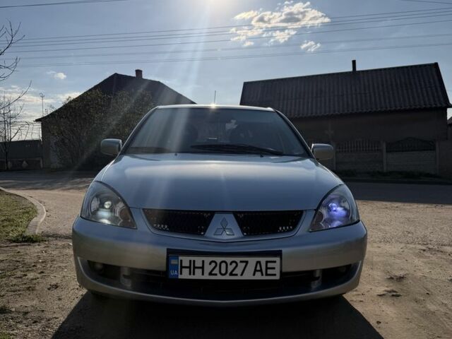Сірий Міцубісі Lancer, об'ємом двигуна 1.6 л та пробігом 294 тис. км за 4300 $, фото 1 на Automoto.ua