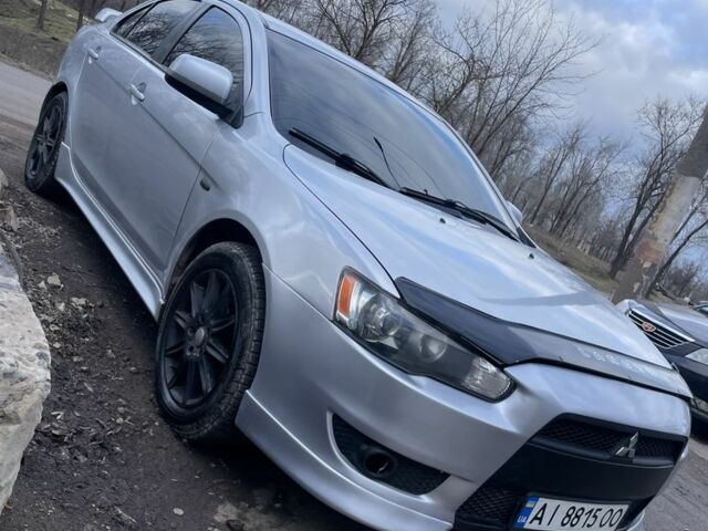 Серый Мицубиси Лансер, объемом двигателя 2 л и пробегом 190 тыс. км за 6500 $, фото 1 на Automoto.ua