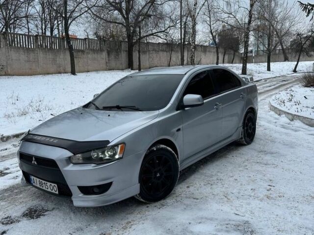 Серый Мицубиси Лансер, объемом двигателя 2 л и пробегом 190 тыс. км за 6900 $, фото 1 на Automoto.ua