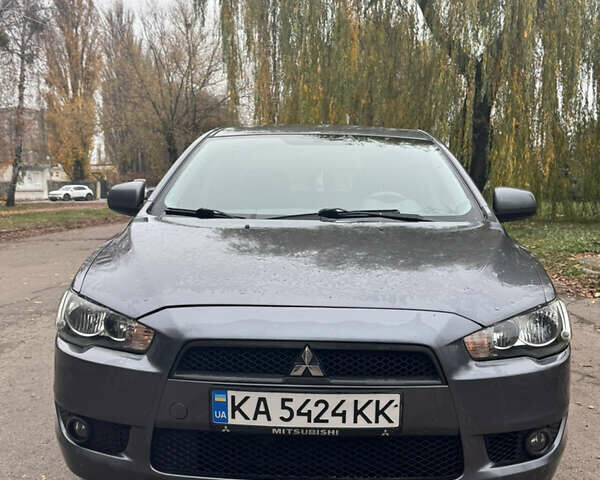 Серый Мицубиси Лансер, объемом двигателя 1.5 л и пробегом 116 тыс. км за 6000 $, фото 1 на Automoto.ua