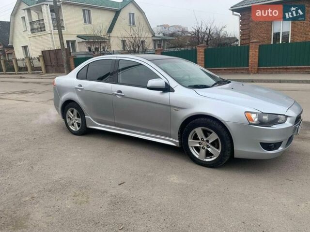 Серый Мицубиси Лансер, объемом двигателя 2 л и пробегом 297 тыс. км за 5350 $, фото 1 на Automoto.ua