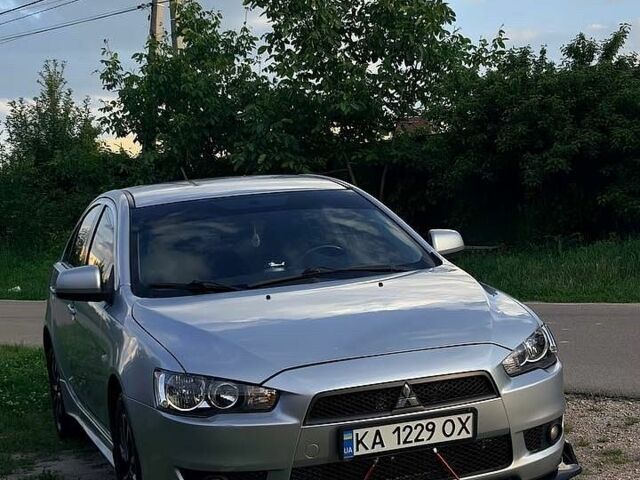 Серый Мицубиси Лансер, объемом двигателя 2 л и пробегом 448 тыс. км за 6800 $, фото 1 на Automoto.ua