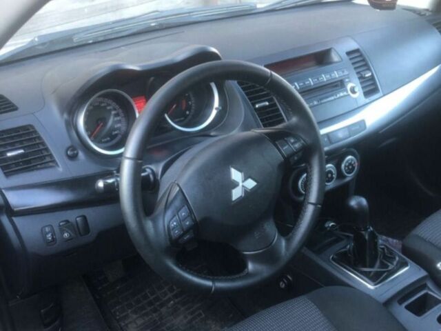 Серый Мицубиси Лансер, объемом двигателя 2 л и пробегом 171 тыс. км за 6200 $, фото 1 на Automoto.ua