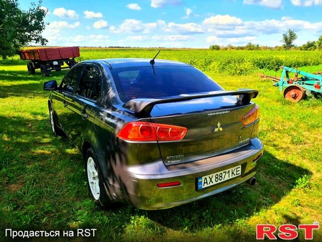 Сірий Міцубісі Lancer, об'ємом двигуна 1.5 л та пробігом 118 тис. км за 7300 $, фото 1 на Automoto.ua