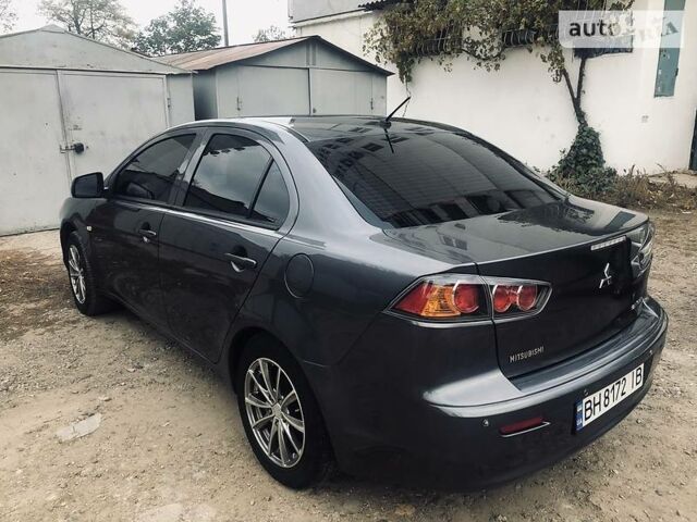 Сірий Міцубісі Lancer, об'ємом двигуна 1.5 л та пробігом 100 тис. км за 8500 $, фото 1 на Automoto.ua