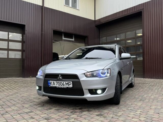 Серый Мицубиси Лансер, объемом двигателя 2 л и пробегом 220 тыс. км за 7450 $, фото 1 на Automoto.ua