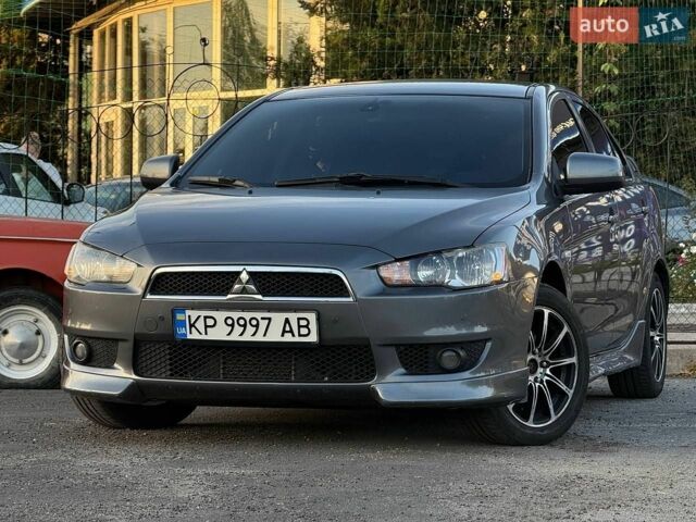 Сірий Міцубісі Lancer, об'ємом двигуна 1.8 л та пробігом 295 тис. км за 5799 $, фото 1 на Automoto.ua