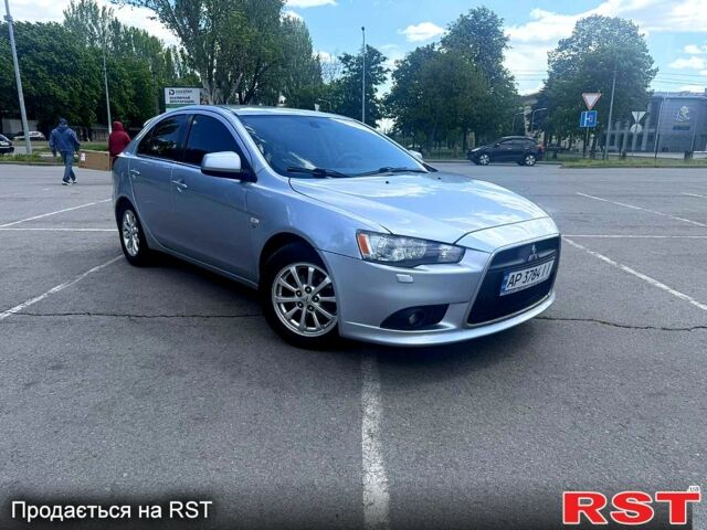 Серый Мицубиси Лансер, объемом двигателя 1.8 л и пробегом 320 тыс. км за 5800 $, фото 1 на Automoto.ua