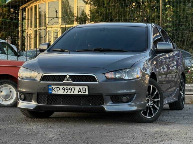 Сірий Міцубісі Lancer, об'ємом двигуна 1.8 л та пробігом 295 тис. км за 5810 $, фото 1 на Automoto.ua