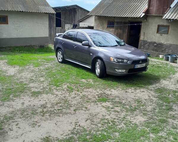 Серый Мицубиси Лансер, объемом двигателя 1.5 л и пробегом 240 тыс. км за 6500 $, фото 1 на Automoto.ua