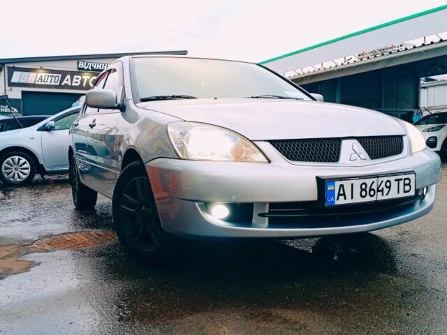 Сірий Міцубісі Lancer, об'ємом двигуна 1.6 л та пробігом 312 тис. км за 5250 $, фото 1 на Automoto.ua