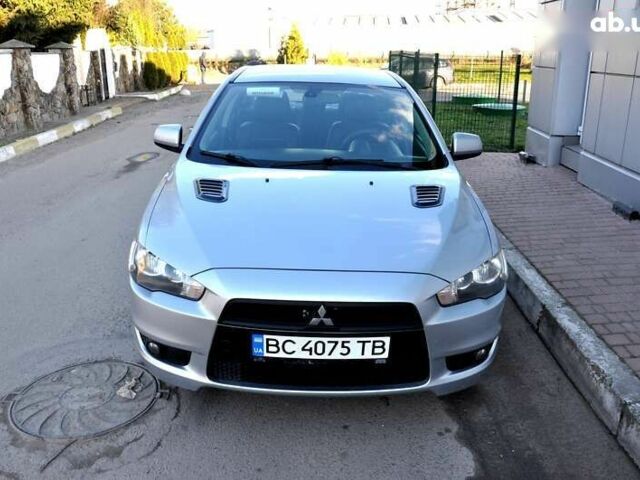 Серый Мицубиси Лансер, объемом двигателя 2 л и пробегом 223 тыс. км за 6500 $, фото 1 на Automoto.ua