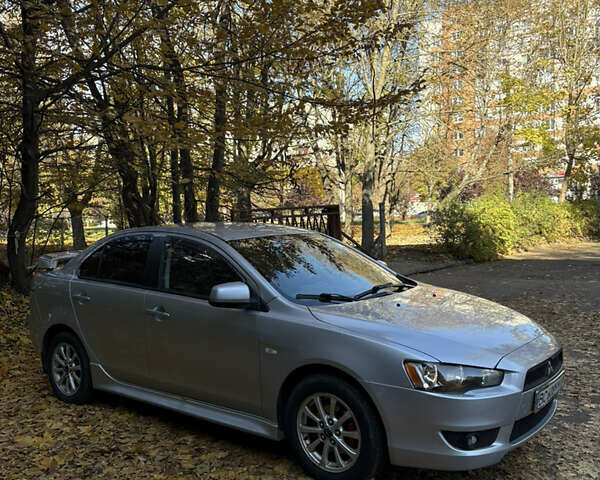 Мицубиси Лансер 2011 в Львове на Automoto.ua Серый Мицубиси Лансер, объемом двигателя 2 л и пробегом 342 тыс. км за 6300 $, фото 1 на Automoto.ua