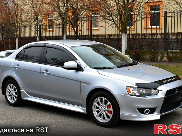 Сірий Міцубісі Lancer, об'ємом двигуна 2 л та пробігом 178 тис. км за 7400 $, фото 1 на Automoto.ua