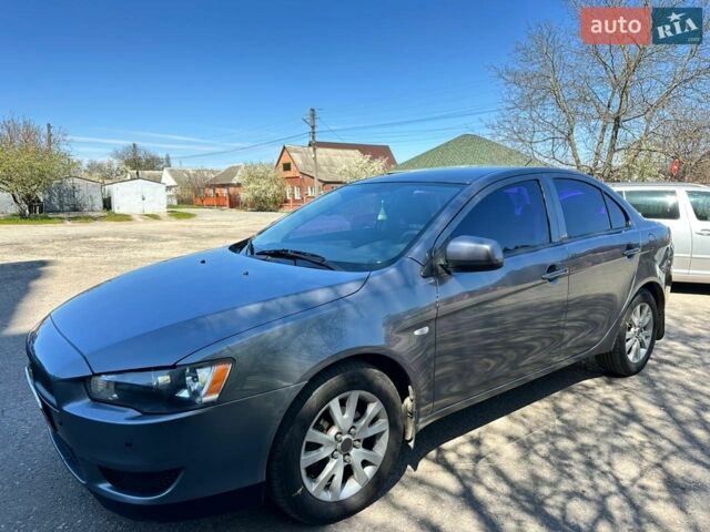 Сірий Міцубісі Lancer, об'ємом двигуна 1.59 л та пробігом 250 тис. км за 7300 $, фото 1 на Automoto.ua