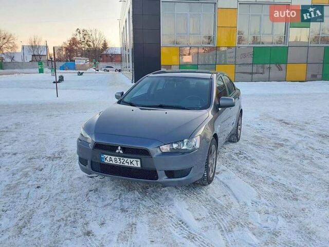 Серый Мицубиси Лансер, объемом двигателя 1.5 л и пробегом 174 тыс. км за 5400 $, фото 1 на Automoto.ua