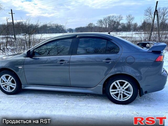 Серый Мицубиси Лансер, объемом двигателя 2 л и пробегом 0 тыс. км за 8500 $, фото 1 на Automoto.ua