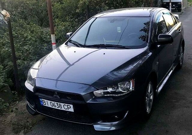 Серый Мицубиси Лансер, объемом двигателя 2 л и пробегом 187 тыс. км за 7500 $, фото 1 на Automoto.ua