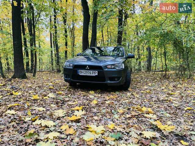 Серый Мицубиси Лансер, объемом двигателя 1.5 л и пробегом 189 тыс. км за 7999 $, фото 1 на Automoto.ua