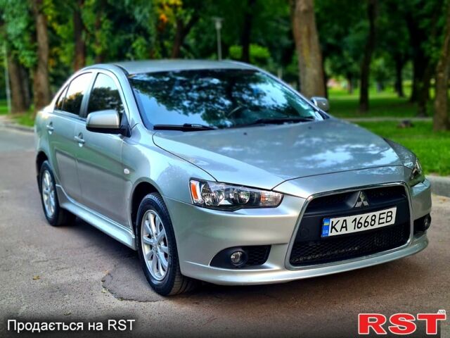 Сірий Міцубісі Lancer, об'ємом двигуна 1.8 л та пробігом 115 тис. км за 8200 $, фото 1 на Automoto.ua