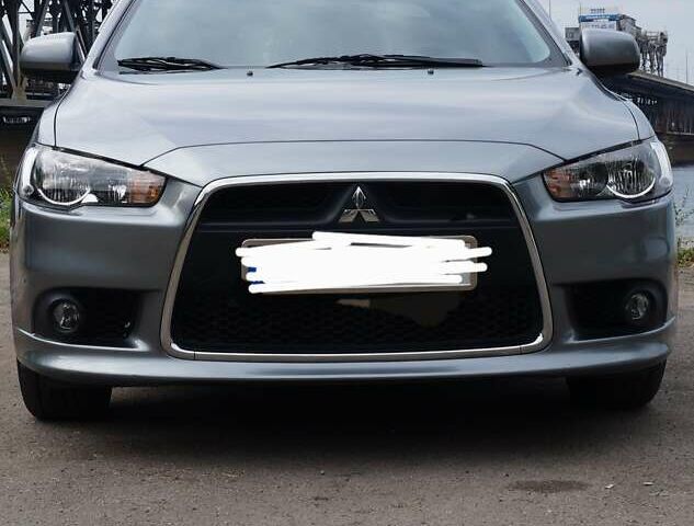 Сірий Міцубісі Lancer, об'ємом двигуна 1.6 л та пробігом 100 тис. км за 10100 $, фото 1 на Automoto.ua