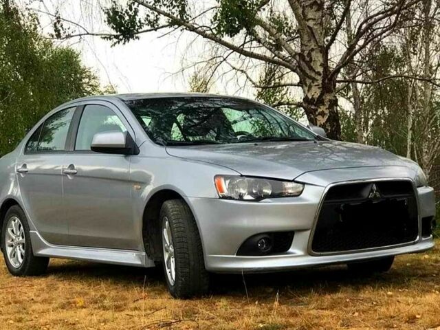 Сірий Міцубісі Lancer, об'ємом двигуна 1.6 л та пробігом 110 тис. км за 7500 $, фото 1 на Automoto.ua