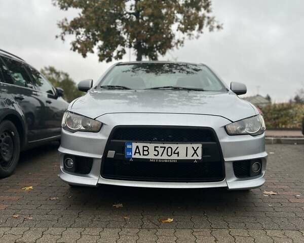 Серый Мицубиси Лансер, объемом двигателя 1.6 л и пробегом 212 тыс. км за 8619 $, фото 1 на Automoto.ua