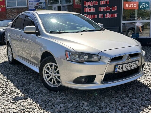Сірий Міцубісі Lancer, об'ємом двигуна 1.6 л та пробігом 203 тис. км за 7500 $, фото 1 на Automoto.ua