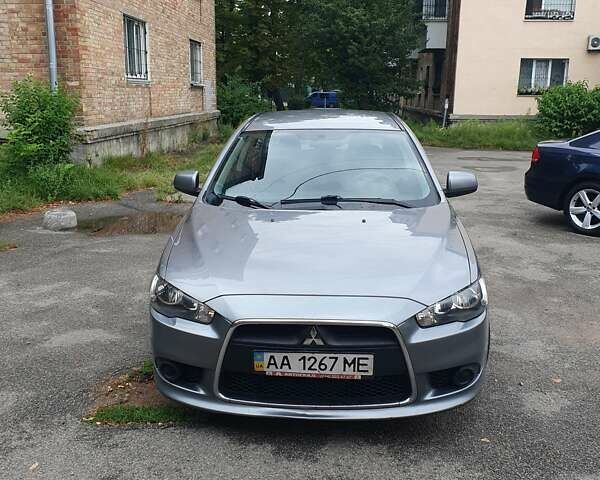 Серый Мицубиси Лансер, объемом двигателя 1.59 л и пробегом 265 тыс. км за 5950 $, фото 1 на Automoto.ua