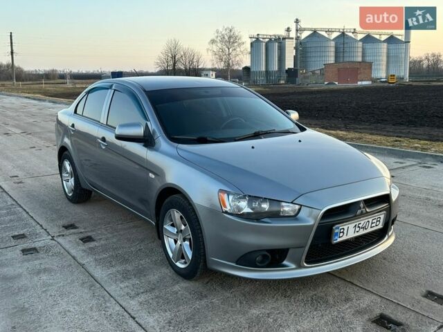 Сірий Міцубісі Lancer, об'ємом двигуна 1.6 л та пробігом 100 тис. км за 7900 $, фото 1 на Automoto.ua