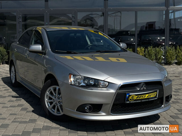 Сірий Міцубісі Lancer, об'ємом двигуна 1.6 л та пробігом 93 тис. км за 9700 $, фото 1 на Automoto.ua