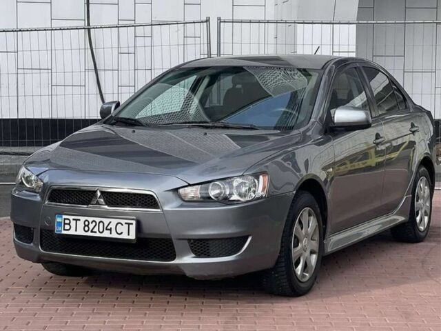 Сірий Міцубісі Lancer, об'ємом двигуна 2 л та пробігом 225 тис. км за 7600 $, фото 1 на Automoto.ua