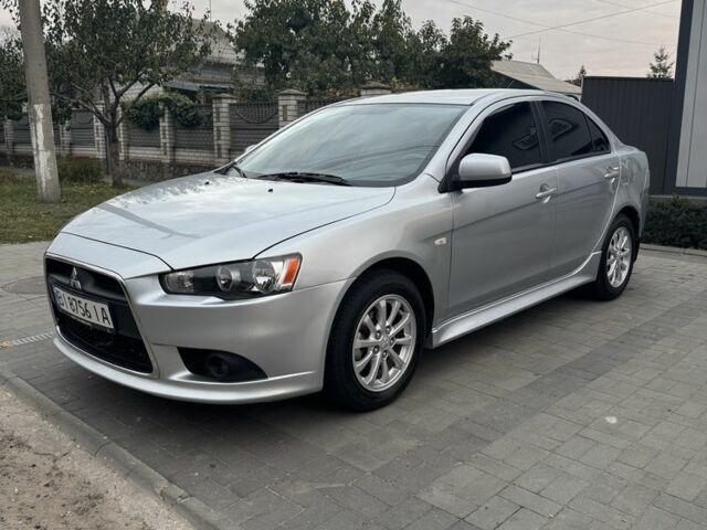 Серый Мицубиси Лансер, объемом двигателя 1.6 л и пробегом 85 тыс. км за 7400 $, фото 1 на Automoto.ua