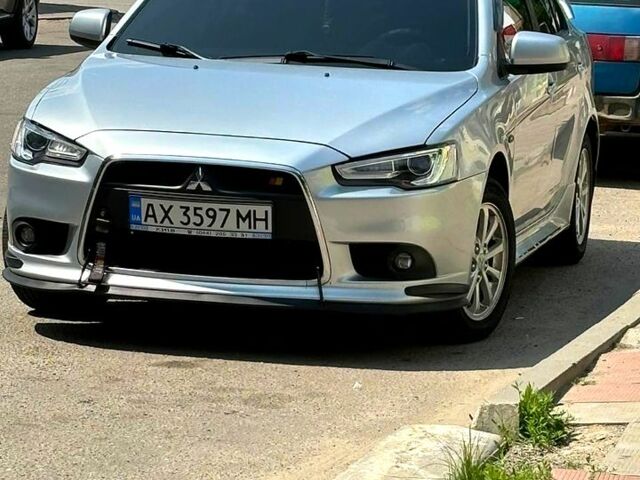 Серый Мицубиси Лансер, объемом двигателя 1.6 л и пробегом 170 тыс. км за 8300 $, фото 1 на Automoto.ua