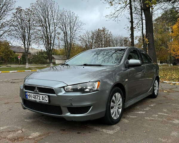 Серый Мицубиси Лансер, объемом двигателя 2 л и пробегом 170 тыс. км за 7400 $, фото 1 на Automoto.ua