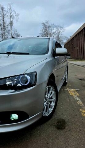 Серый Мицубиси Лансер, объемом двигателя 1.6 л и пробегом 79 тыс. км за 8500 $, фото 1 на Automoto.ua