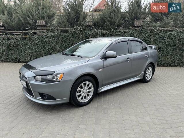 Сірий Міцубісі Lancer, об'ємом двигуна 1.6 л та пробігом 65 тис. км за 9500 $, фото 1 на Automoto.ua