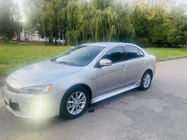 Серый Мицубиси Лансер, объемом двигателя 2 л и пробегом 180 тыс. км за 9500 $, фото 1 на Automoto.ua