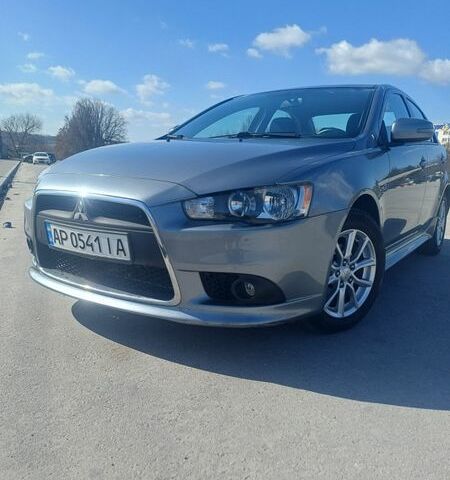 Серый Мицубиси Лансер, объемом двигателя 2 л и пробегом 118 тыс. км за 7000 $, фото 1 на Automoto.ua