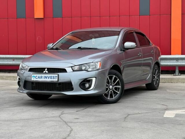 Серый Мицубиси Лансер, объемом двигателя 2 л и пробегом 170 тыс. км за 9500 $, фото 1 на Automoto.ua