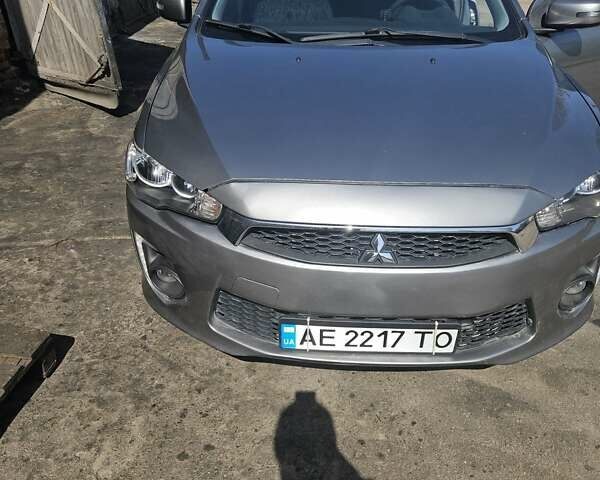 Серый Мицубиси Лансер, объемом двигателя 2 л и пробегом 142 тыс. км за 10500 $, фото 1 на Automoto.ua