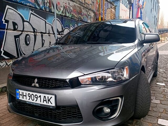 Серый Мицубиси Лансер, объемом двигателя 2 л и пробегом 15000 тыс. км за 8999 $, фото 1 на Automoto.ua