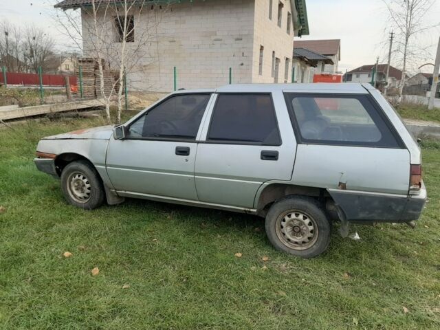 Сірий Міцубісі Lancer, об'ємом двигуна 1.5 л та пробігом 10 тис. км за 664 $, фото 1 на Automoto.ua