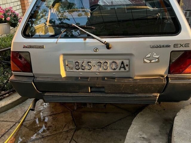 Сірий Міцубісі Lancer, об'ємом двигуна 1.5 л та пробігом 371 тис. км за 2000 $, фото 1 на Automoto.ua
