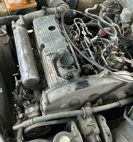 Серый Мицубиси Лансер, объемом двигателя 2 л и пробегом 160 тыс. км за 1600 $, фото 1 на Automoto.ua