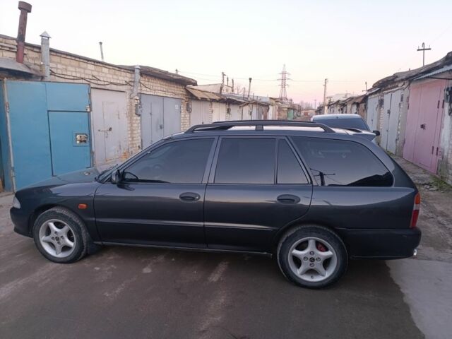 Серый Мицубиси Лансер, объемом двигателя 1.6 л и пробегом 197 тыс. км за 2800 $, фото 1 на Automoto.ua